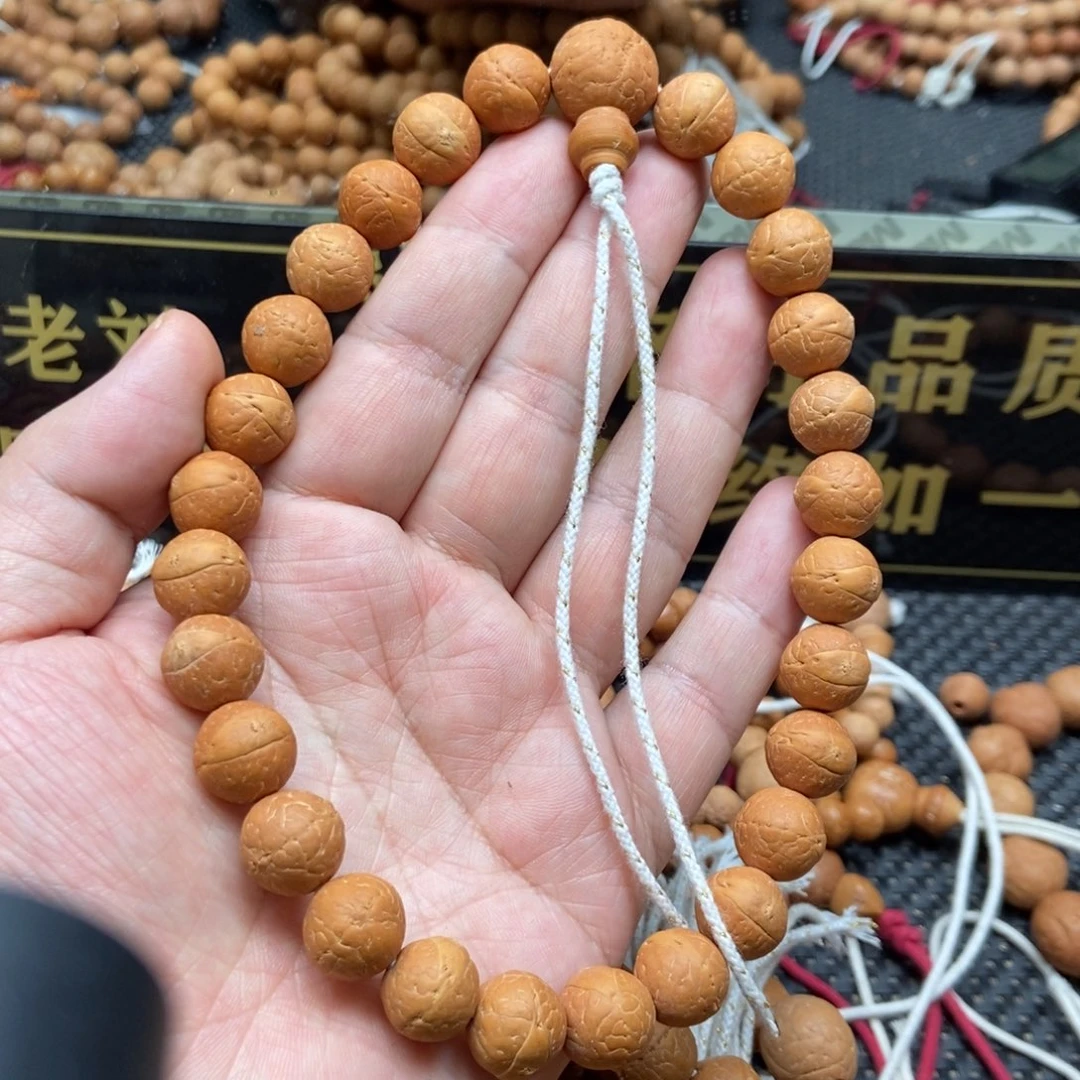 凤眼菩提吊坠12.5+手持