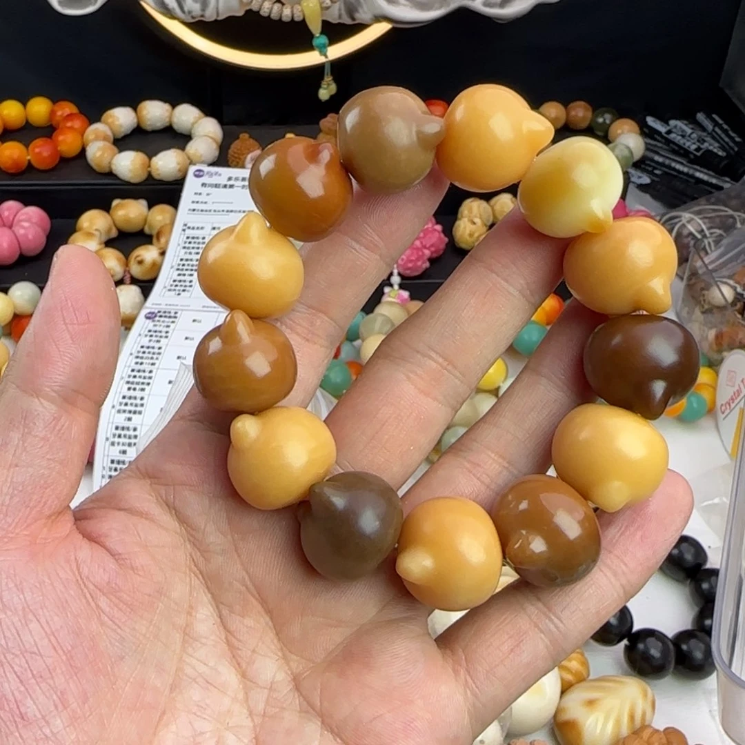 菩提根/象牙果吊坠奶**茶瑕疵卡20-21猫头手串一条