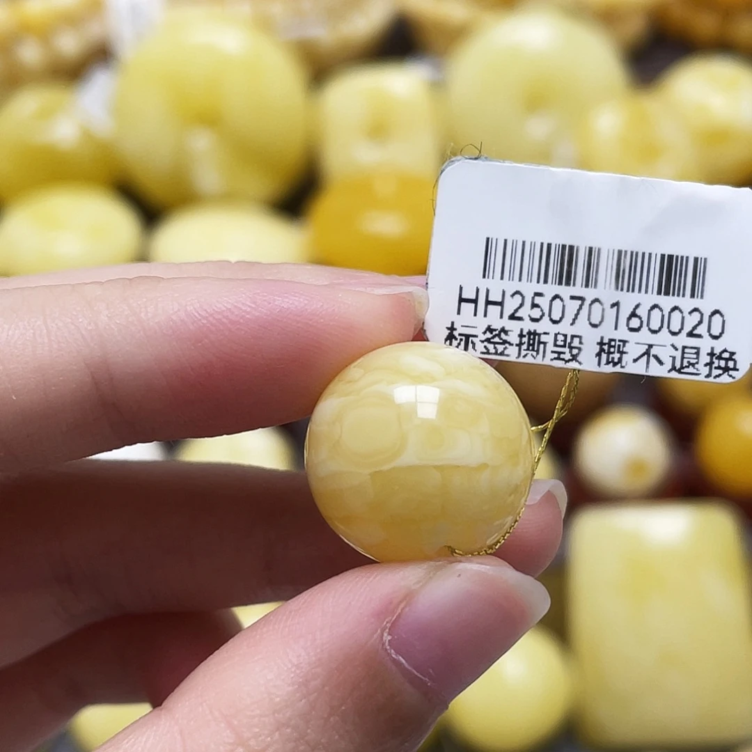 琥珀未镶嵌裸石16.7mm浓蜡白妖花圆珠.瑕皮色