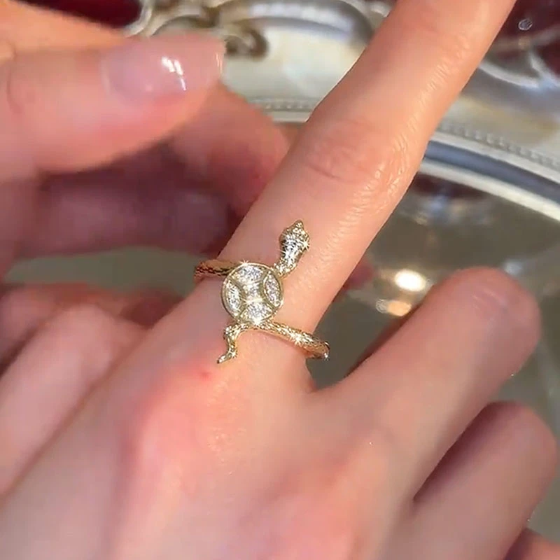 铜合金合成锆石戒指 轻奢高级感灵蛇旋转戒指开口戒指小众设计女