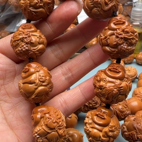 坨***坨吊坠桃核橄榄雕工艺品