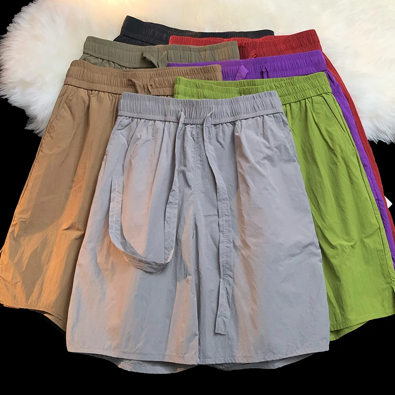 夏季薄款冰丝速干运动短裤男女情侣款沙滩裤子潮流外穿宽松休闲裤