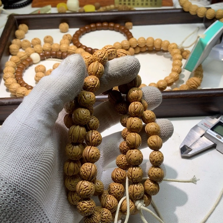 小***儿吊坠桃核桃核手串