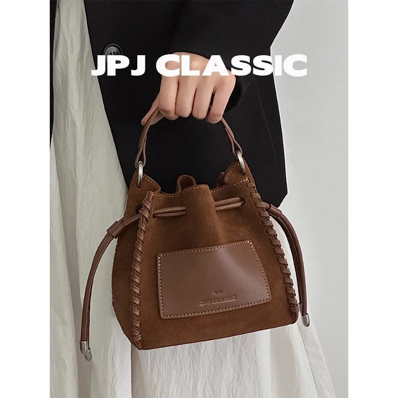 jpj磨砂牛皮褶皱包女单肩斜挎福袋水桶包抽绳菜篮子通勤包1863