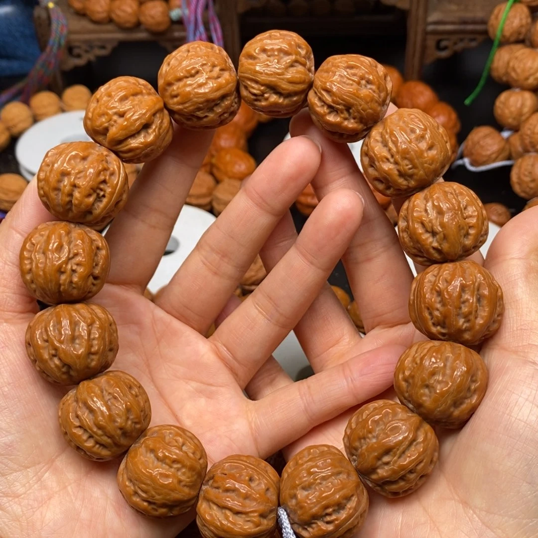 桃核手串水晶肉筋