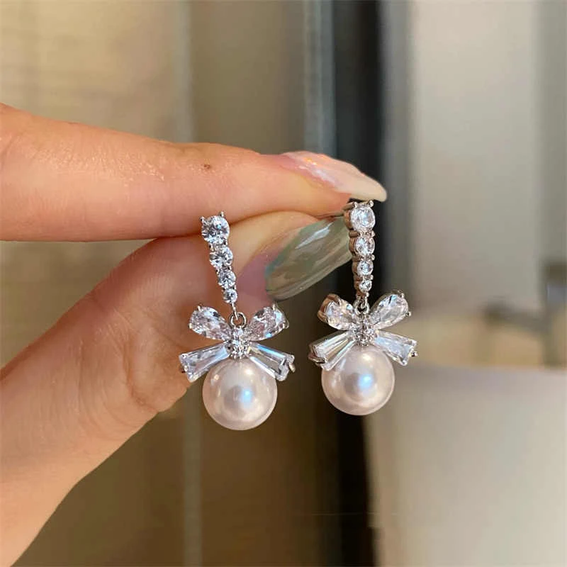 铜合金仿珍珠耳饰 超闪耳钉蝴蝶结珠珠吊坠耳坠甜美小众百搭耳饰