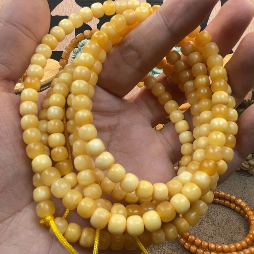 星月菩提吊坠7×6老型蛋黄半玉化脖挂