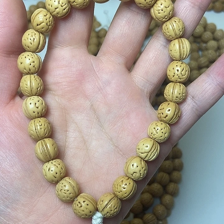 吊坠桃核野生桃核手持