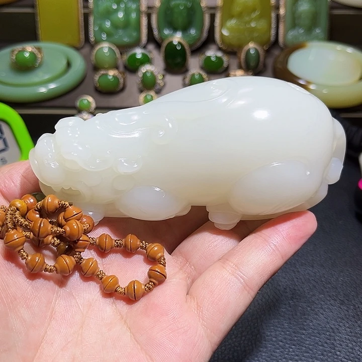 照***呗和田玉未镶嵌把件