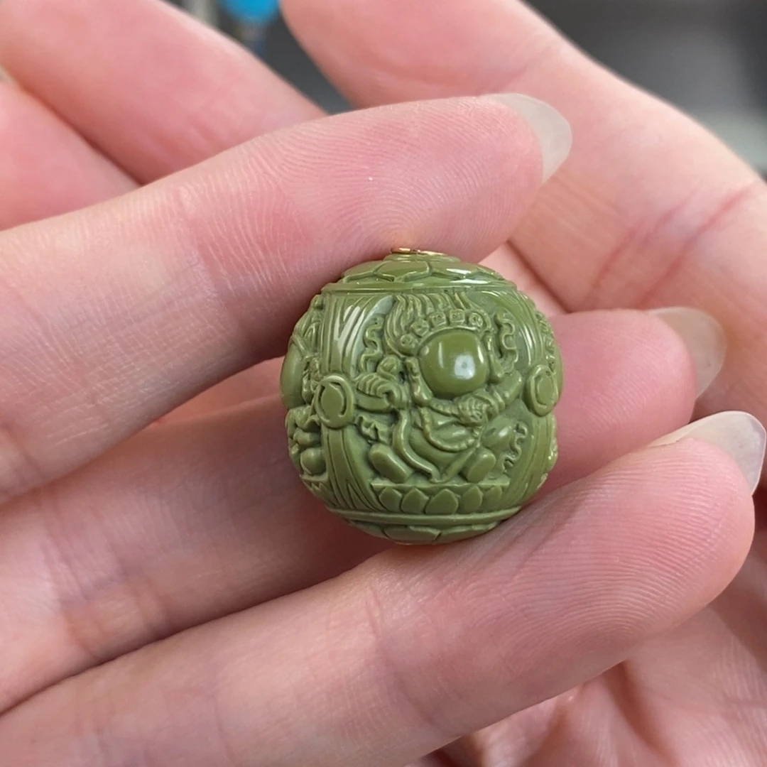 绿松石未镶嵌。菜籽四面宝宝佛