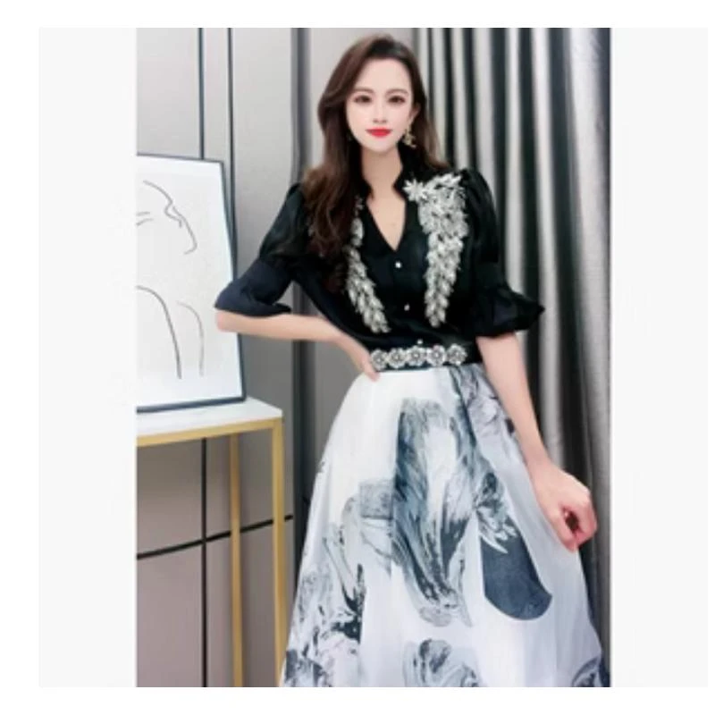 芙娜妮轻奢国内设计师时尚品牌秋季新款轻奢设计感裙子F2220472B