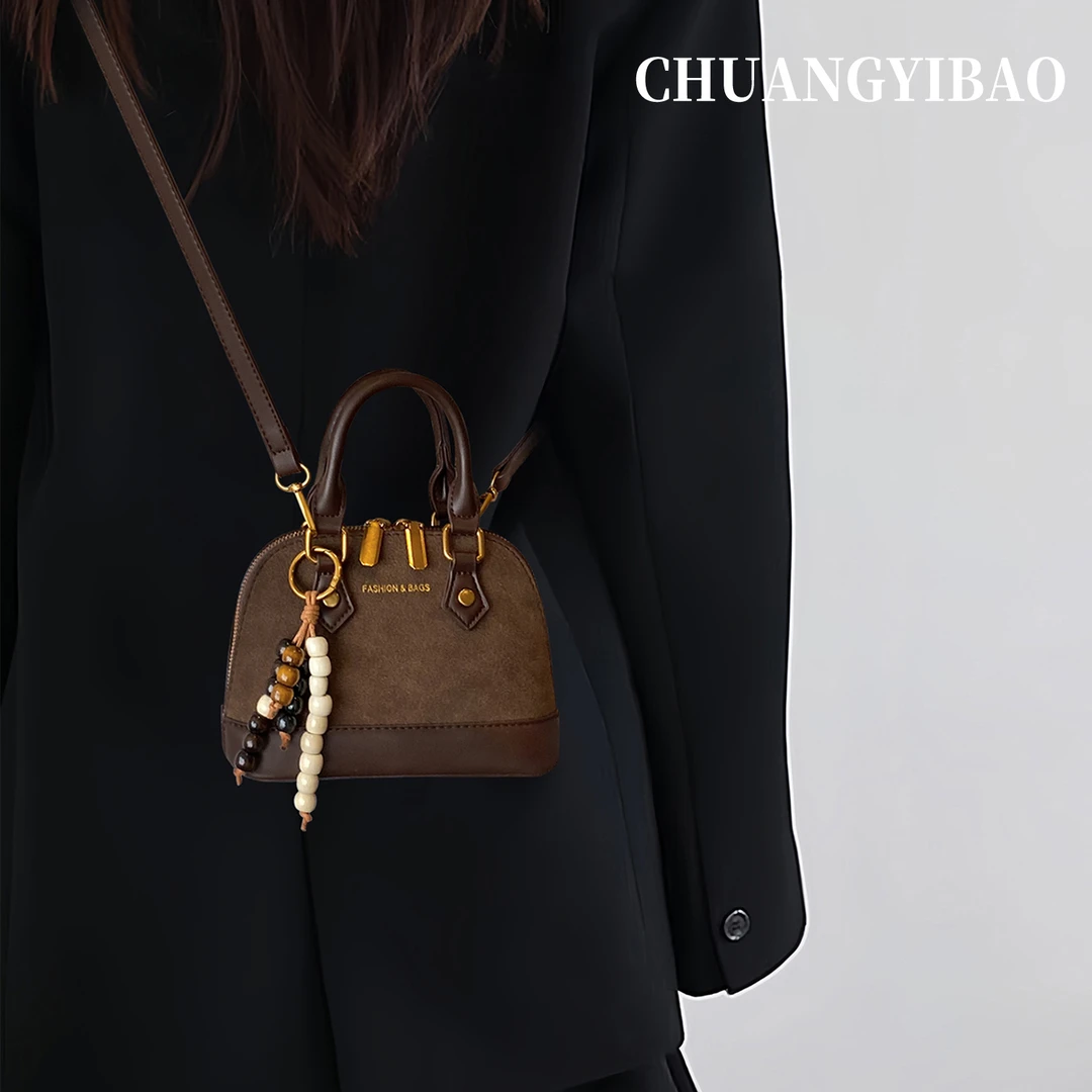 棕色秋冬超火云朵包包女式2025新款轻奢小众高级感斜挎手提小拎包