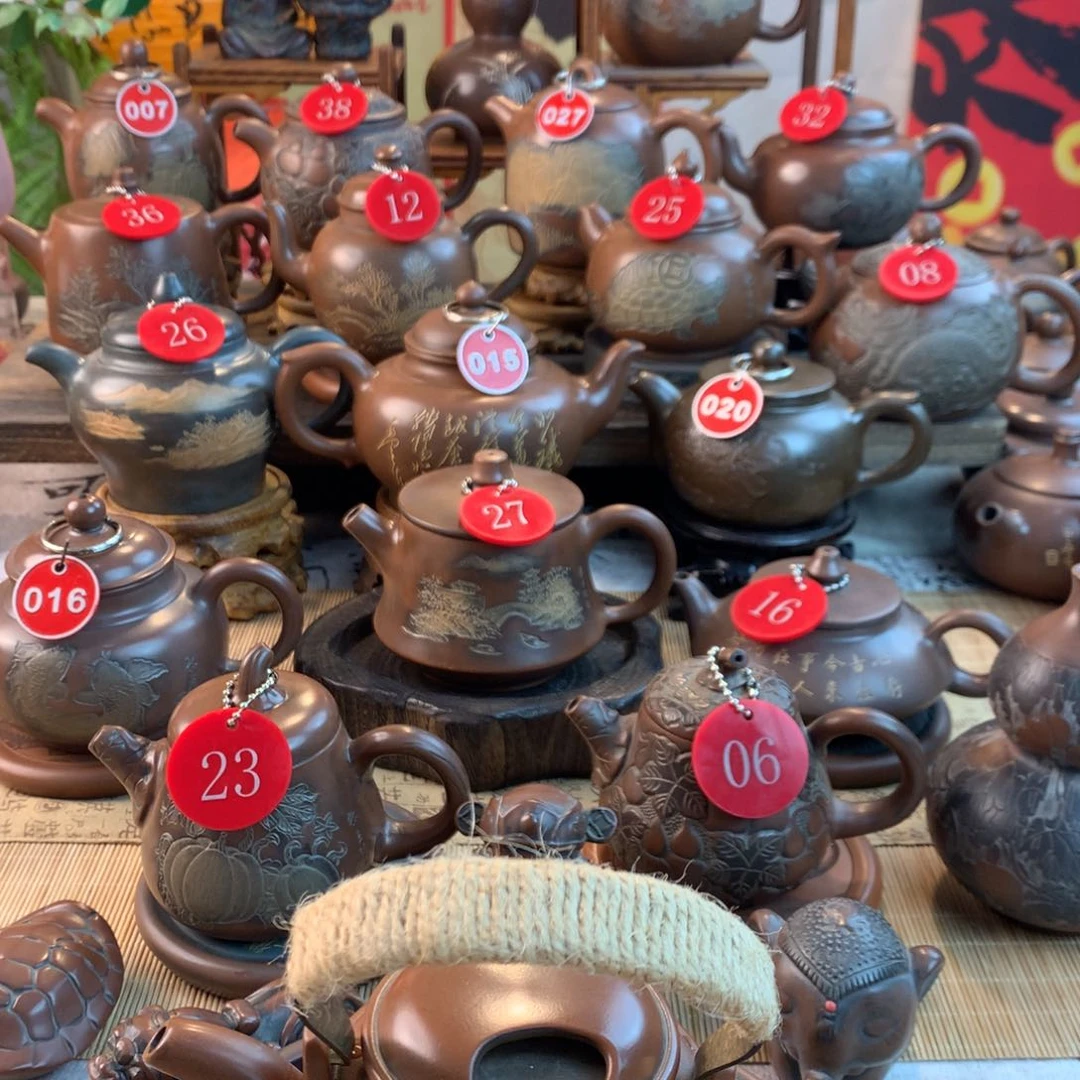 迪****海黎昌权浮雕洋桶壶