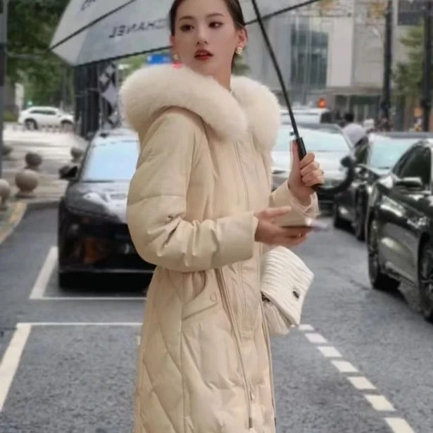 海宁皮衣女2025冬季新款时尚洋气连帽毛领皮羽绒服加厚中长款外套