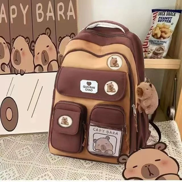 卡皮巴拉小学生书包棕色2024 新款护脊学院风高颜值1—6年级大容量