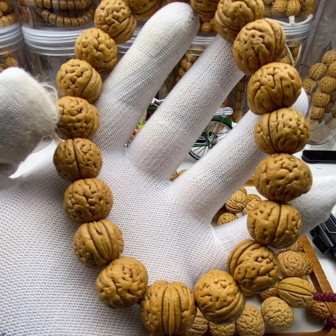 米***达吊坠桃核桃核6666