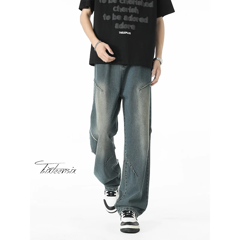 美式褶皱潮牌牛仔裤男春秋新款高街水洗做旧宽松直筒解构弯刀裤子