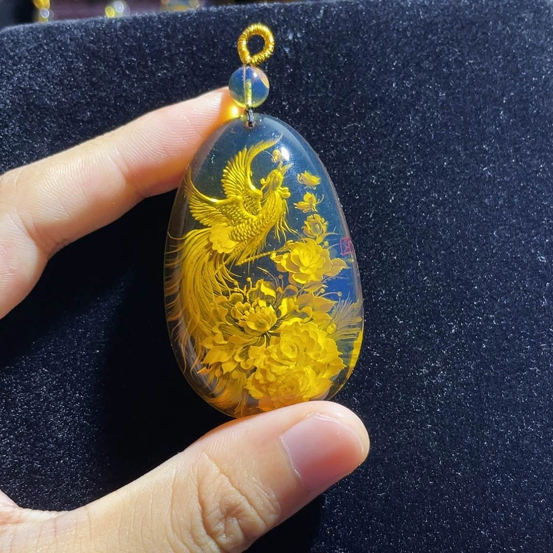 琥珀颈饰未镶嵌蓝珀凤穿牡丹阴雕吊坠