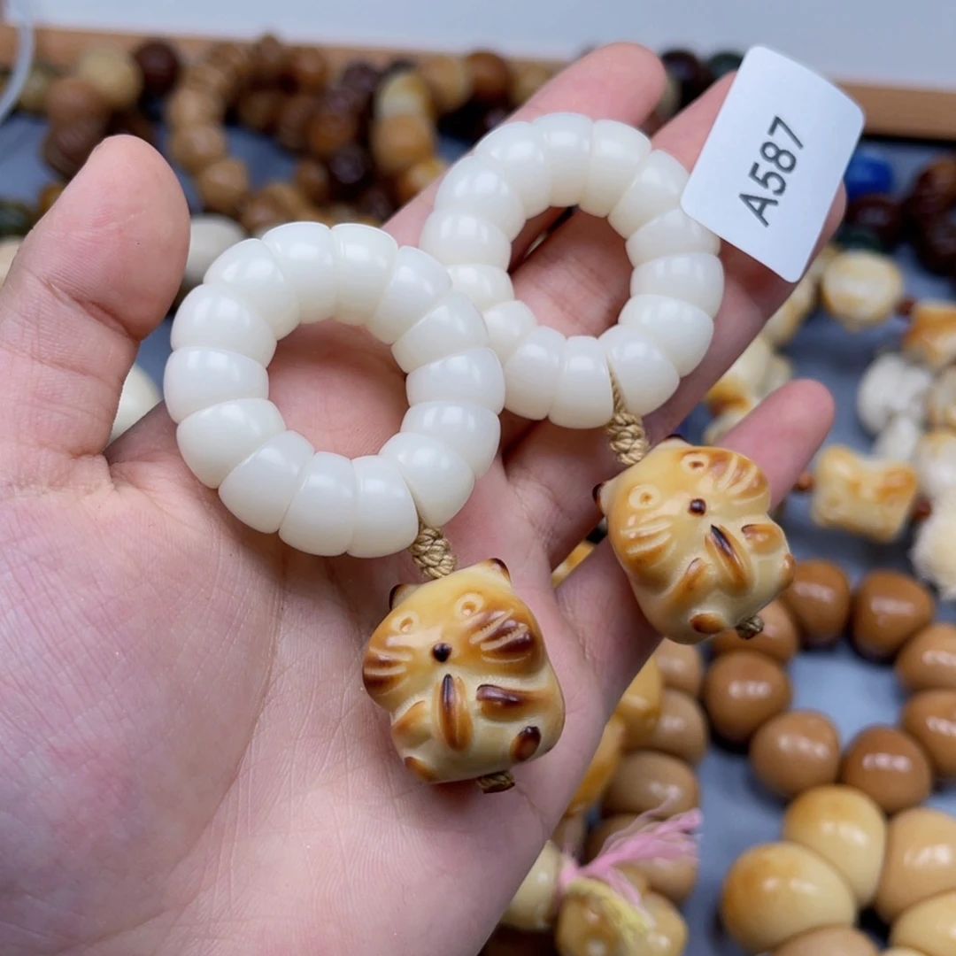 吊坠菩提根/象牙果A587大肠12mm微瑕一串随机