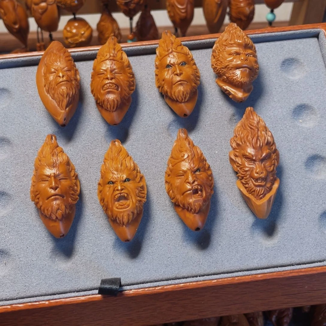 橄榄核吊坠大圣手串