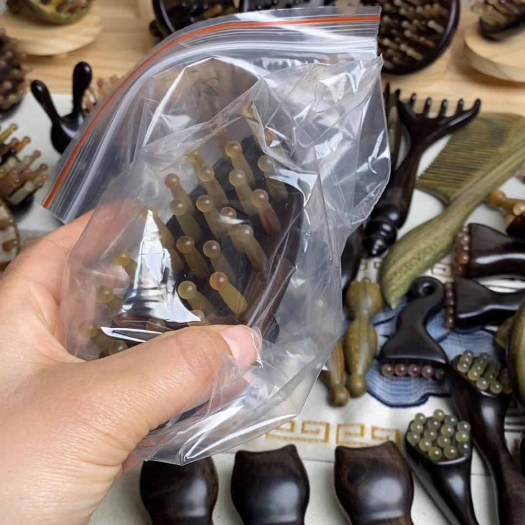 色***彩瑕疵紫光檀按摩梳子