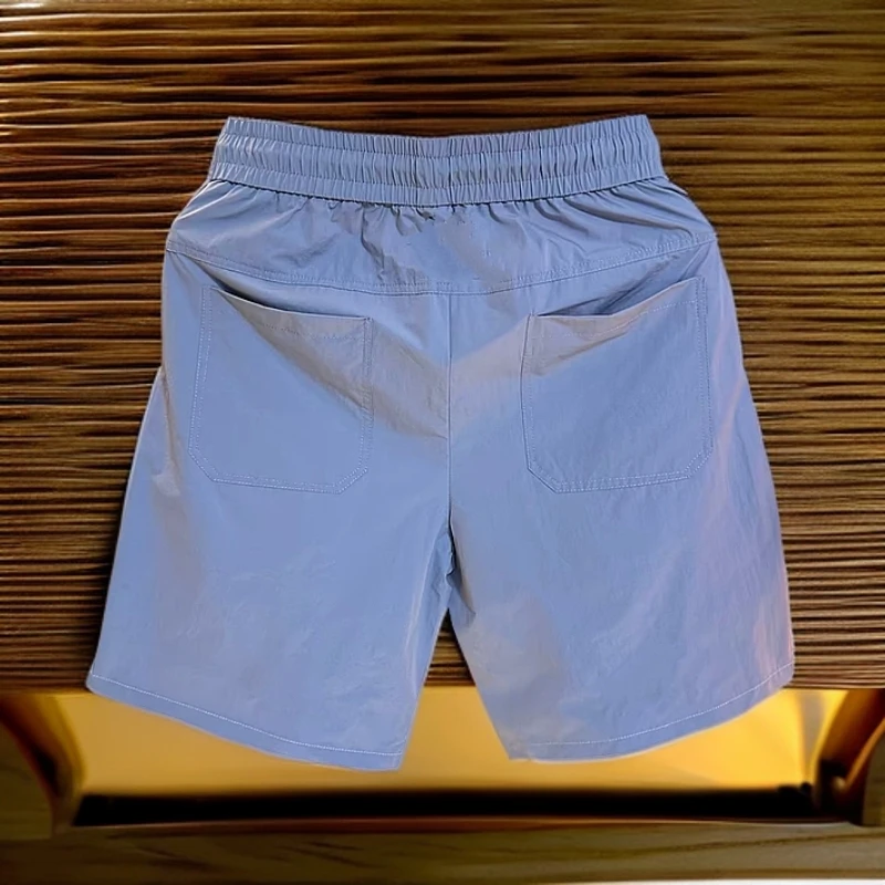 205夏季新款刺绣时尚休闲打孔速干短裤