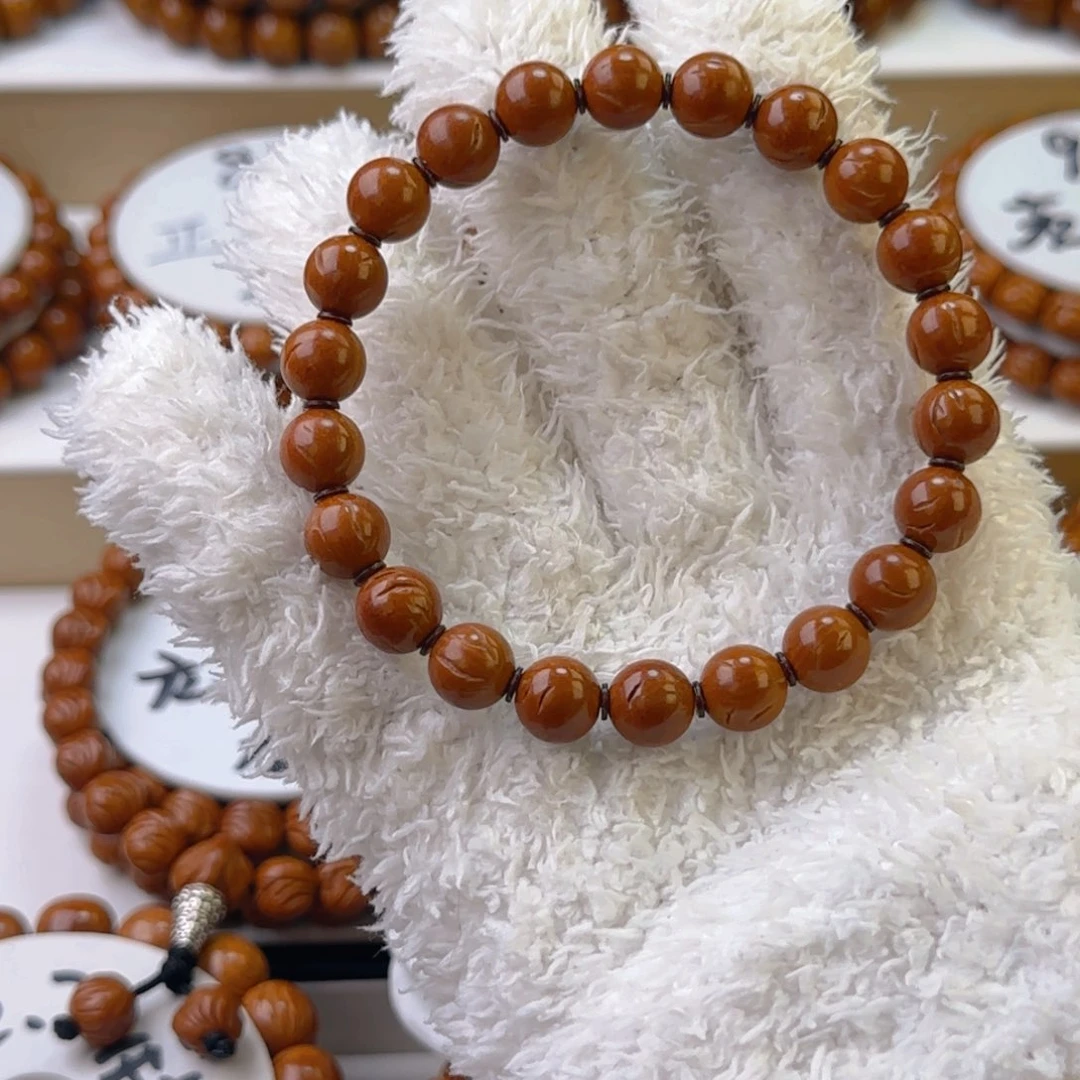 桃核手串龙纹正圆光珠桃核