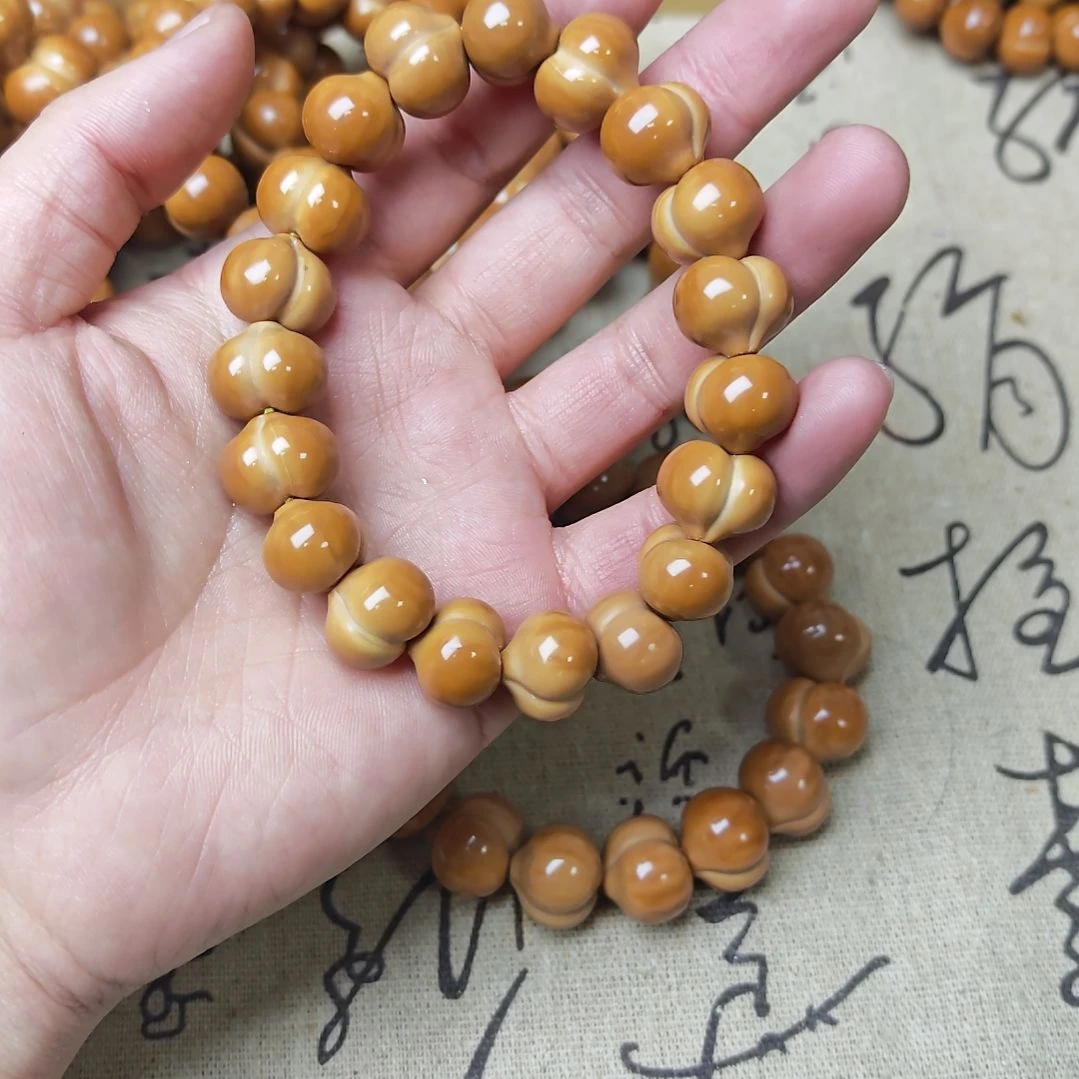 吊坠猴头核桃屁桃手串瑕款