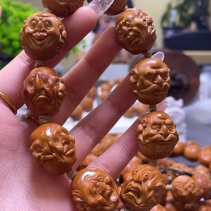 藏***布橄榄核吊坠橄榄核雕