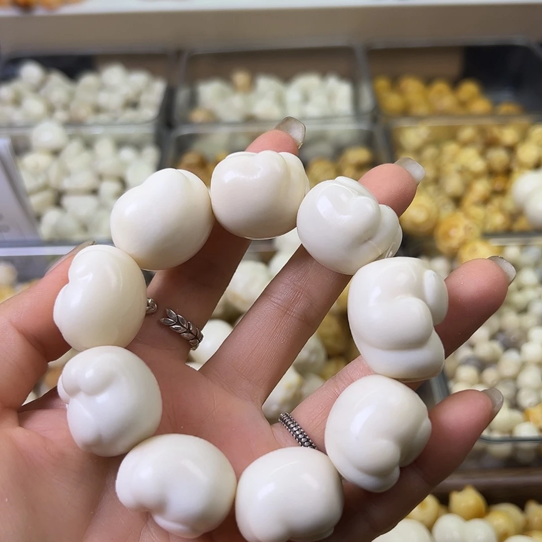 菩提根/象牙果手串瑕疵熊爪混1条表面孔道有裂卡24左右