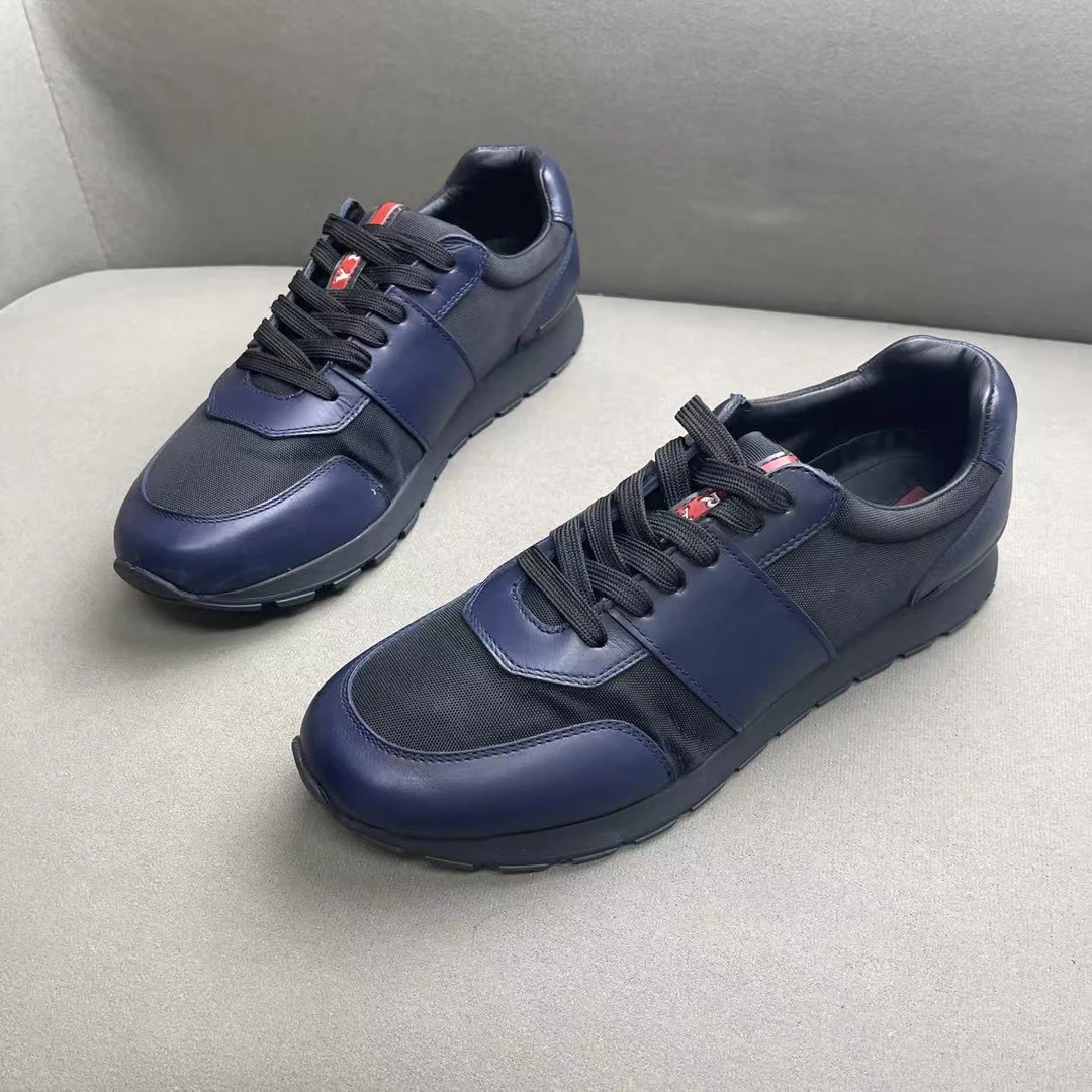 95新 Prada/普拉达 蓝色网面皮革拼接透气舒适红标运动鞋 42码