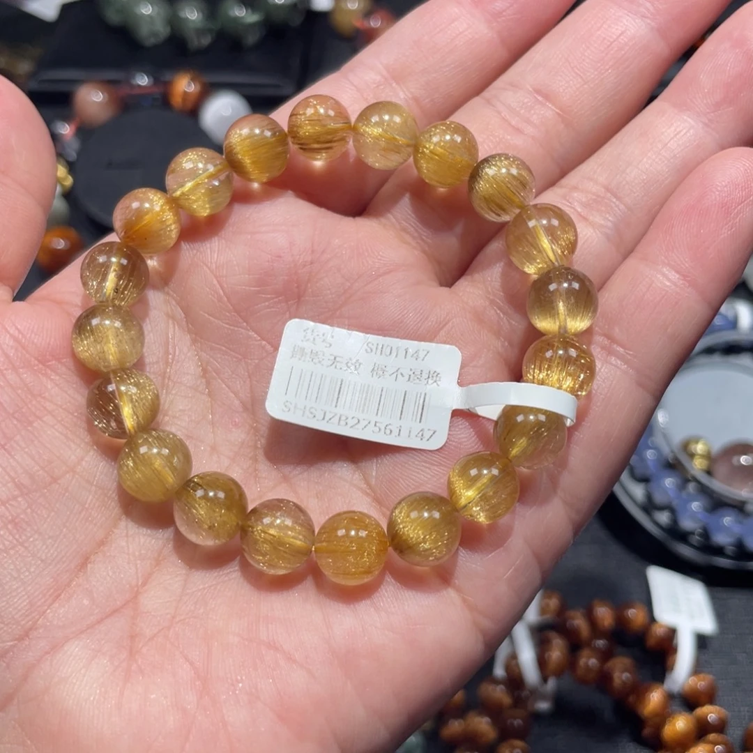 乖***张未镶嵌手链水晶金发晶9mm左右