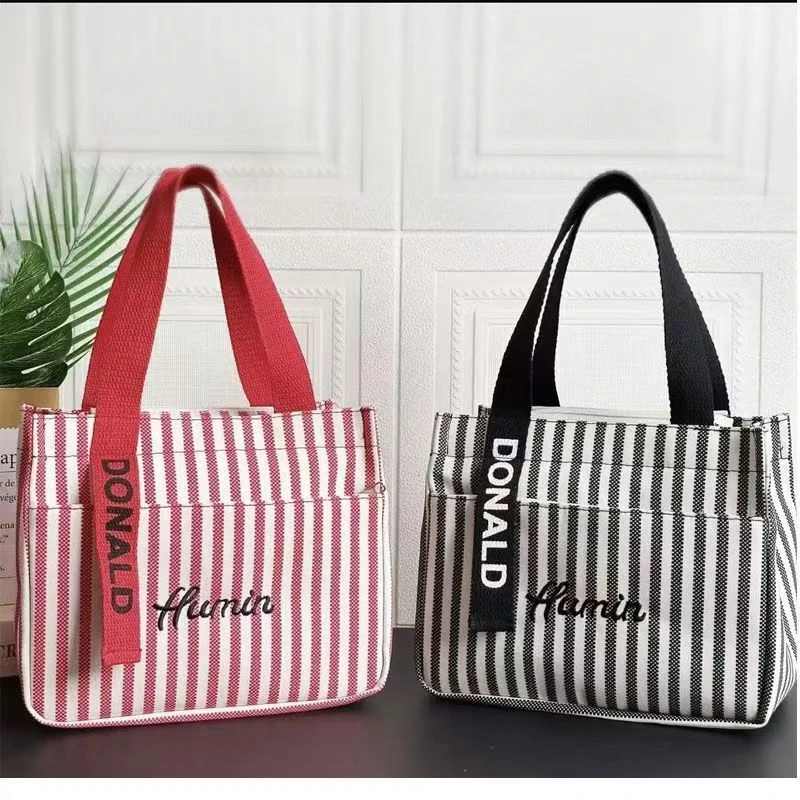 条纹拉链外口袋帆布手提包时尚女包便当包大容量妈咪包上班零食包