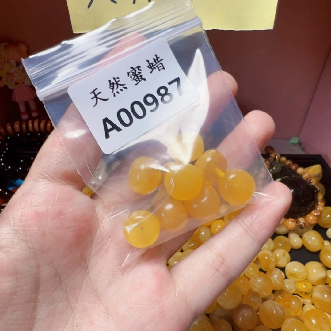 未镶嵌琥珀裸石木*987号，9颗12+mm