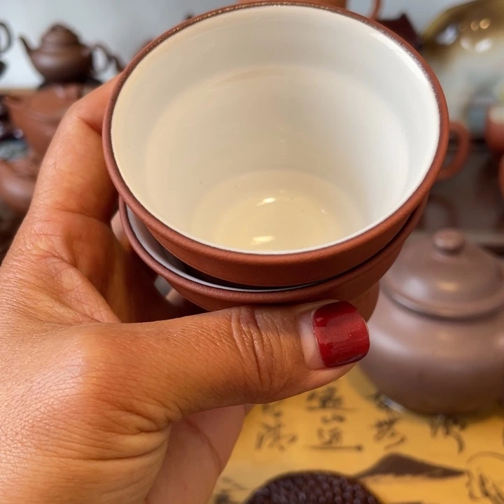 紫砂茶壶向*进清水面兴红