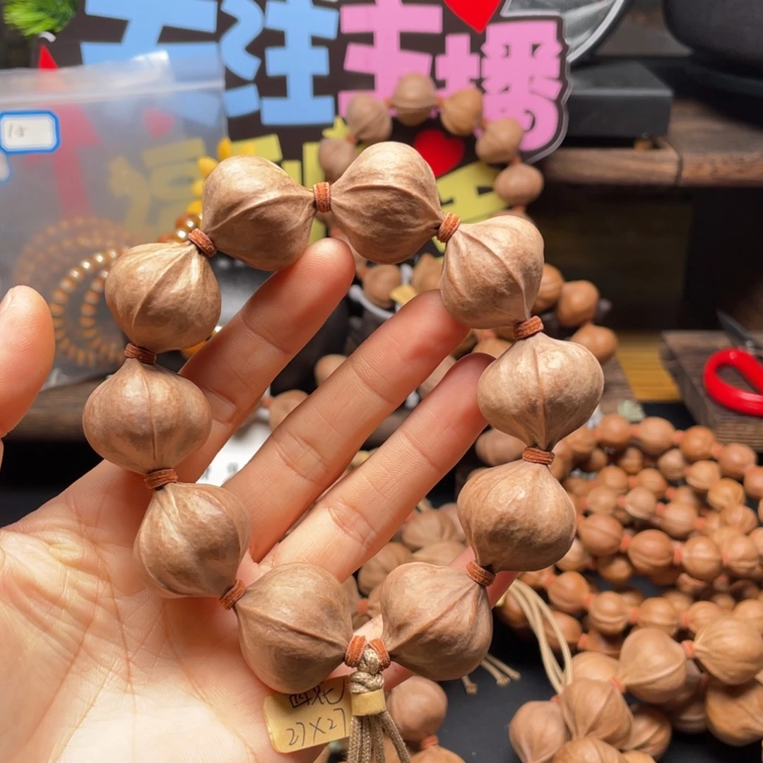 天***子吊坠橄榄核2727四花铁核