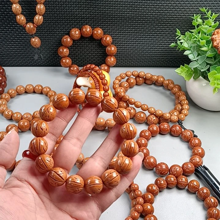 桃核手串铁籽密纹黄皮15
