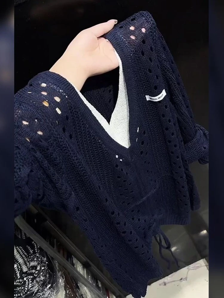 流光风2025秋季新款女装设计感小众高级感上衣透气镂空长袖针织衫