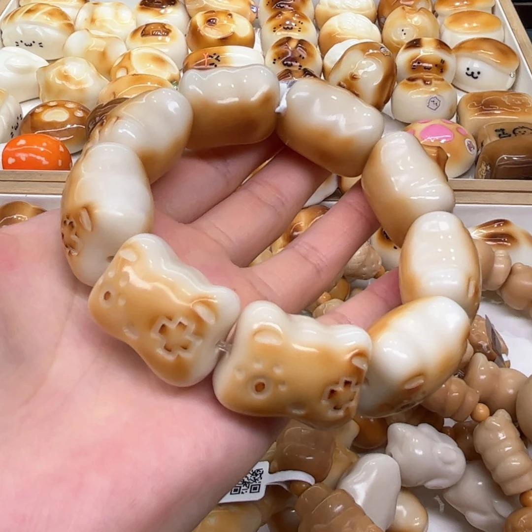 菩提根/象牙果手串7.17.24象牙果游戏机猫头微瑕