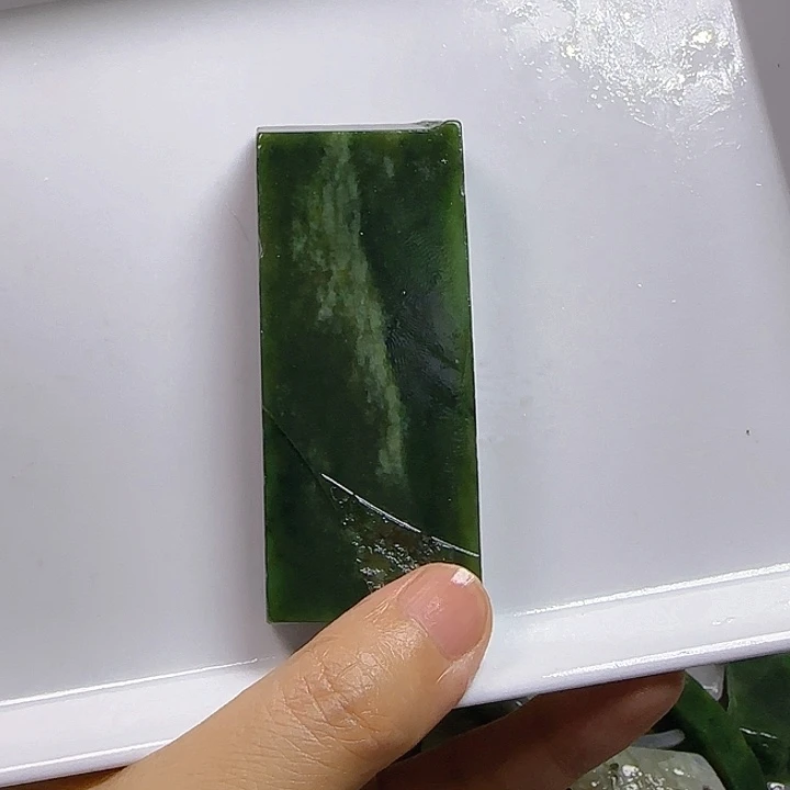 畅***由和田玉未镶嵌挂件