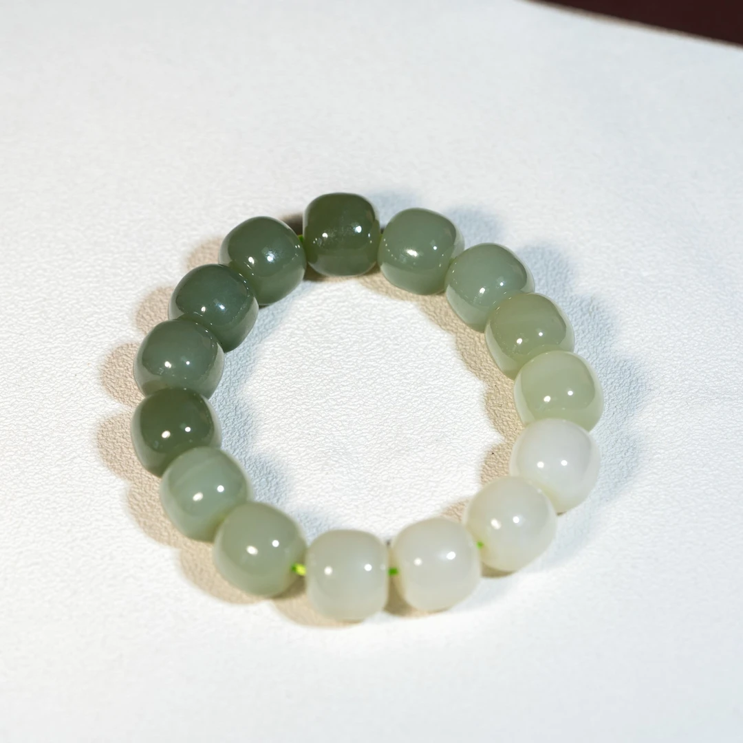 【巴基斯坦】50528-LKCP12和田玉渐变桶珠手串 14*13多样性发货64g