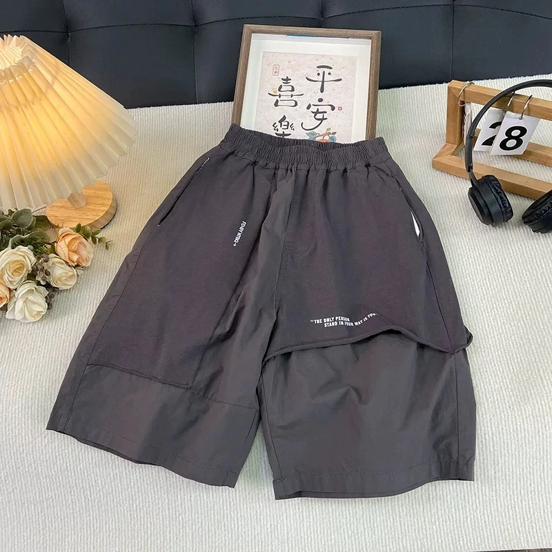 A071 男童酷帅拼接款工装五分裤