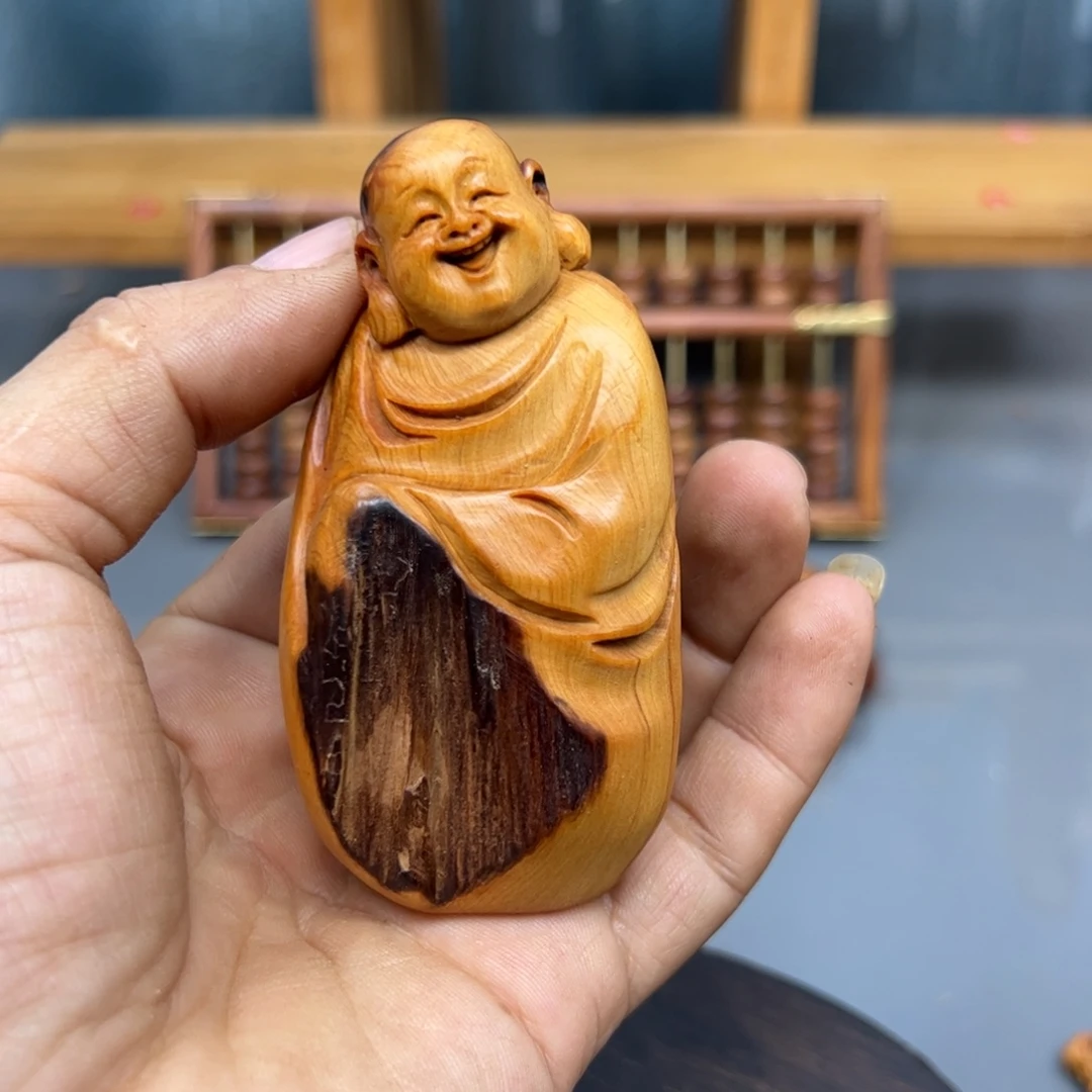 潇***潇木崖柏木摆件手把件