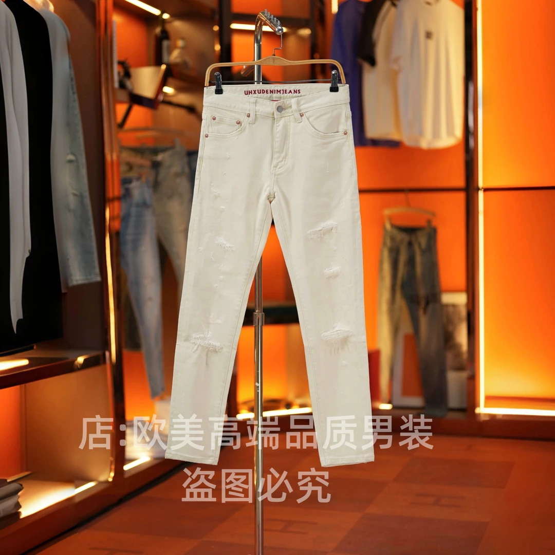 秋冬季轻奢美式原创高端米杏色破洞刺绣男士牛仔裤修身小脚弹力潮