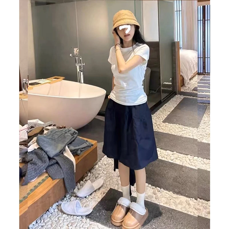 显白藏青色高级感半身裙女夏季新款百搭松紧腰显瘦蓬蓬裙a字裙子