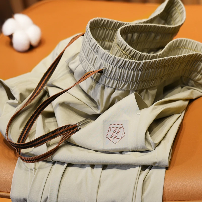 轻奢级夏季轻薄款冰丝速干裤子男修身小脚高端欧货休闲运动裤男士