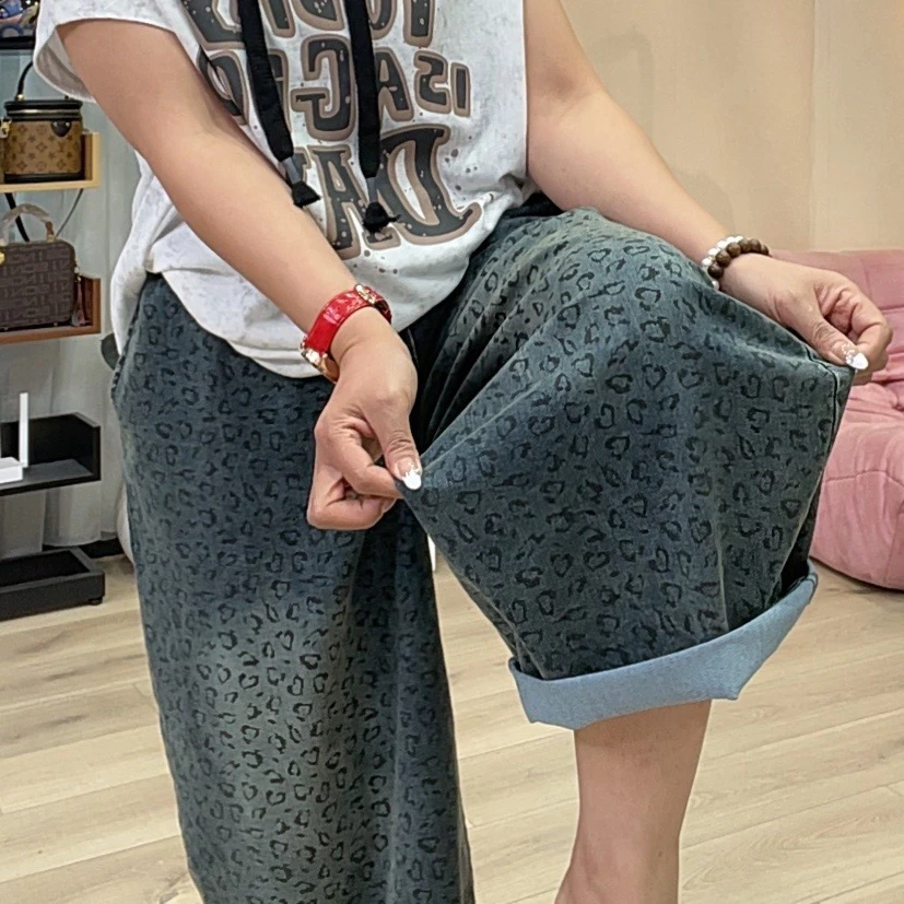 646牛仔黑色小豹纹大版九分牛仔裤女