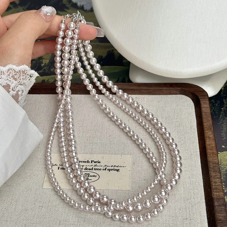 不锈钢仿珍珠吊坠 曼塔玫瑰色施家珍珠项链冷光丝绸小米珠项链