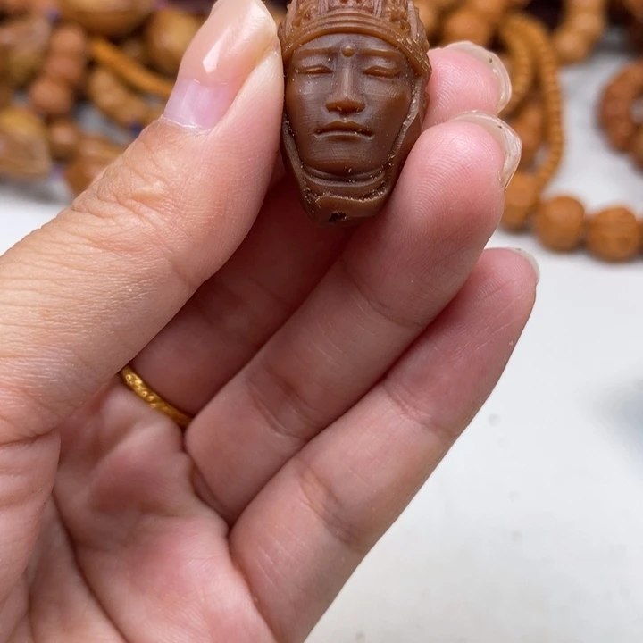 星***純吊坠橄榄核玉华单子