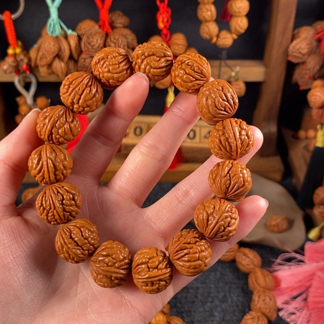 吊坠桃核桃枭手串